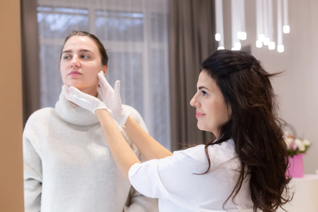 Dermatologist checking to the patient